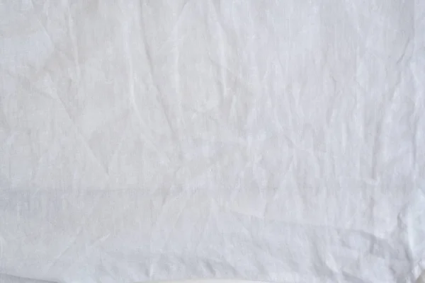 Kırışmış pamuk beyazı, pürüzsüz kumaş. Doku arkaplanı — Stok fotoğraf