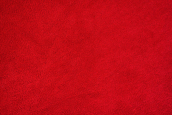 Гладкая бесшовная текстура махрового полотенца. Красный цвет
