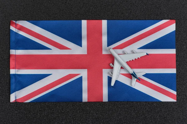 Σημαία Ηνωμένου Βασιλείου Και Παιχνίδι Αεροπλάνο Αεροπορικές Μετακινήσεις Στο Ηνωμένο — Φωτογραφία Αρχείου