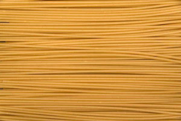 Raw Pasta Closeup Background Italian Spaghetti Textured Background Culinary Theme — Stock Photo, Image