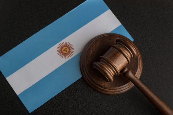 Lawyers wooden gavel on Argentine flag background. Court in Argentina