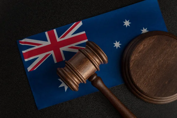 Judge gavel on Australian flag. Court in Australia. Australian auction.