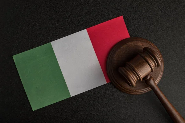 Judge gavel and Italian flag. Law and justice. Protection of rights of population
