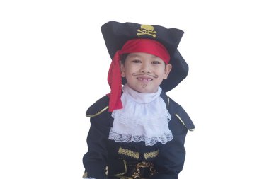 Asian boy smiling in pirate costume isolated over white clipart