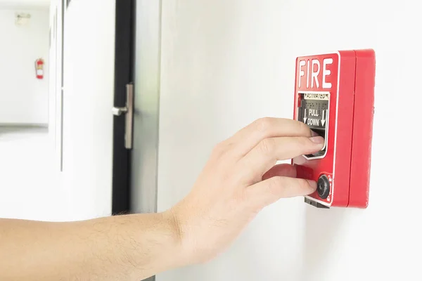 Man Reaching His Hand Push Fire Alarm Hand Station — Stock Photo, Image