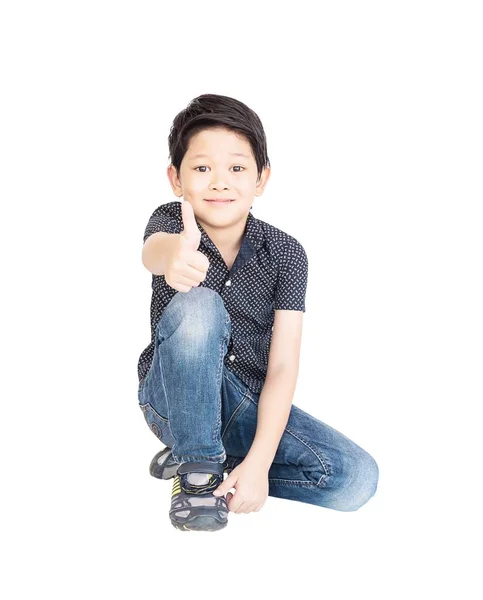 Азіатський Хлопчик Показують Великі Пальці Вгору Сидячи Ізольовані Шпалерами Білого — стокове фото
