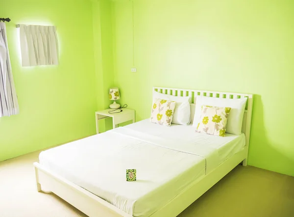 Colourful green couple bedroom