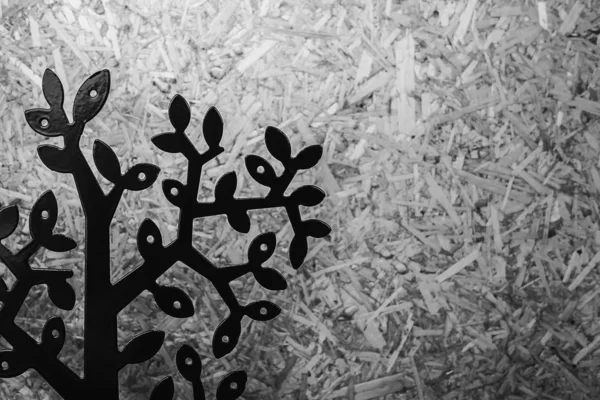 Monochrome color of decorating tree over wood pulp board background