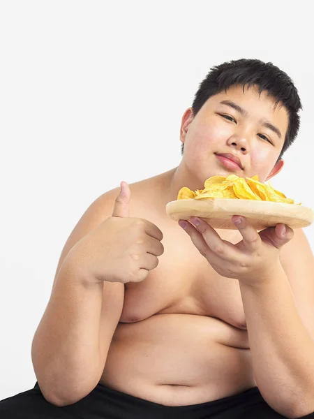 Fat Boy Happily Eating Chip Photo Focused His Right Hand — Stock Photo, Image