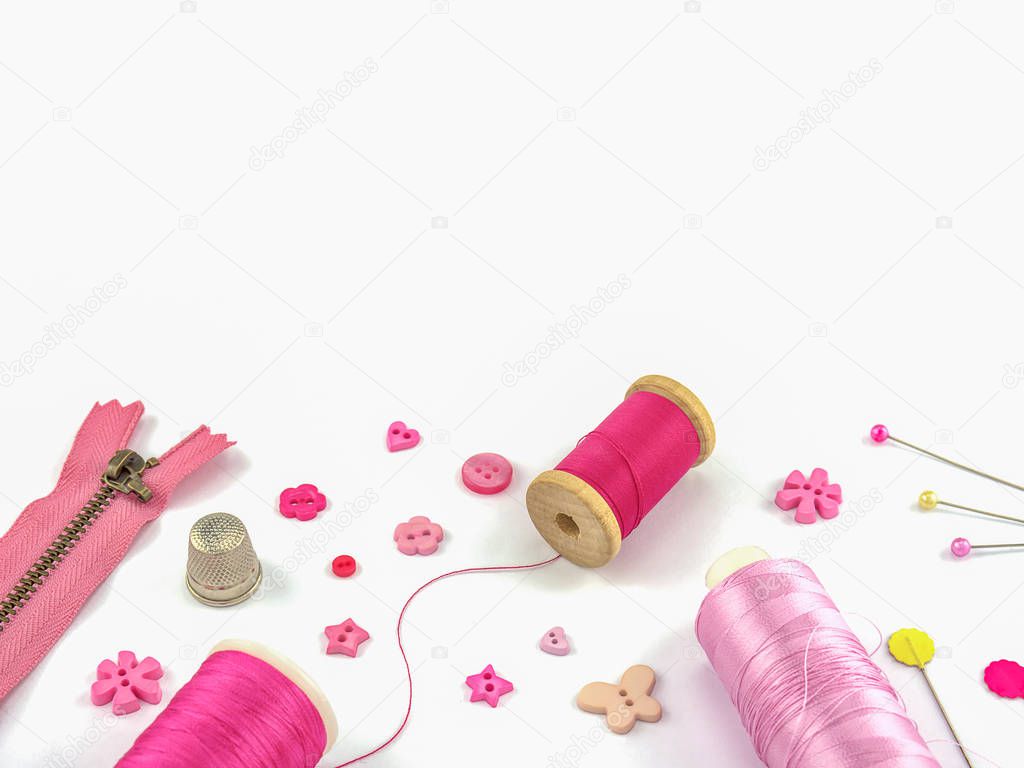 Pink embroidery set over white background