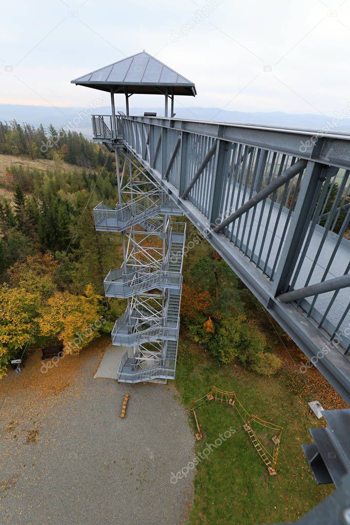 Modern metal outlook tower with wide foot bridge