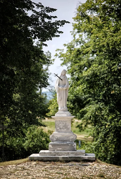 Statue of Saint-Marry with sword in chest — Stok fotoğraf