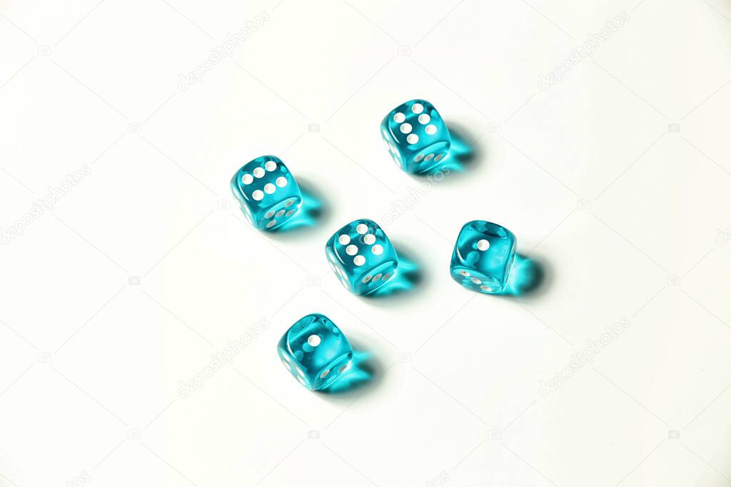 Isolated blue transparent dice showing three six and two ones