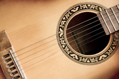 Bir akustik gitar - atış closeup parçası