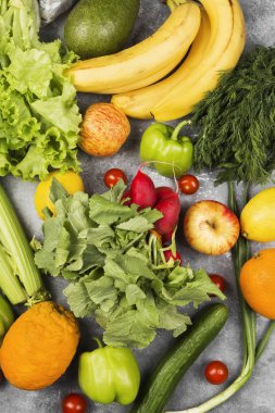 Gri arka plan üzerinde çeşitli sağlıklı gıda. Üstten görünüm. Gıda arka plan
