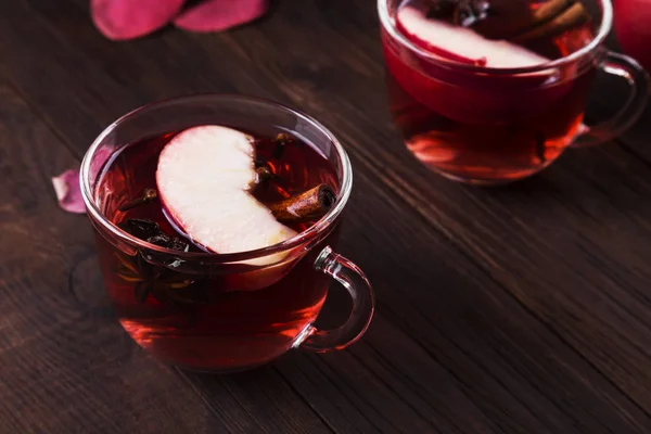 Hot drink with hibiscus red tea with apple, cinnamon and anise t