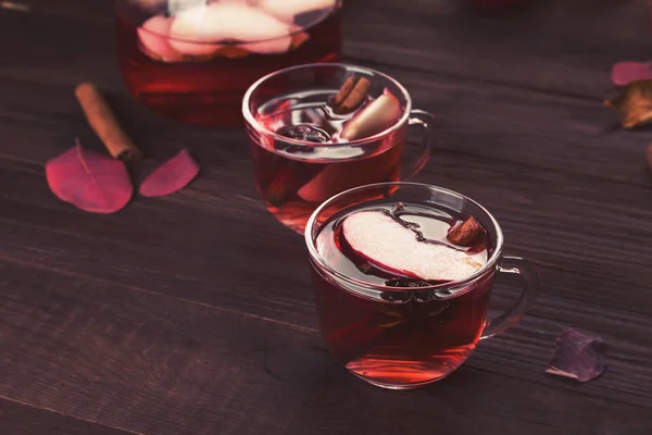 Hot drink with hibiscus red tea with apple, cinnamon and anise i