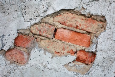 Eski bir çimento tuğla duvar parçası - duvar kırık bir parça