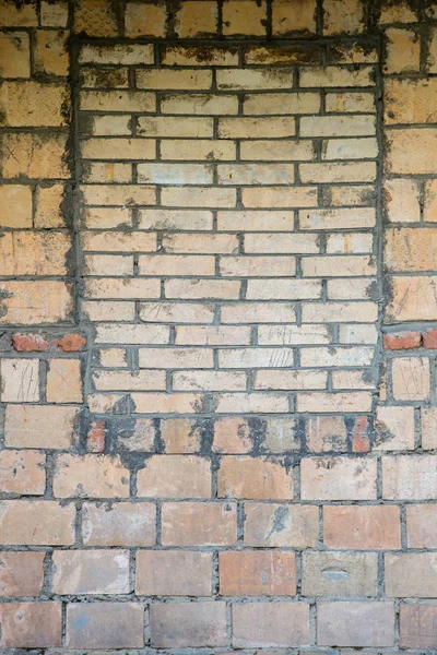 フレームパッチ付きの古いレンガの壁のテクスチャ — ストック写真