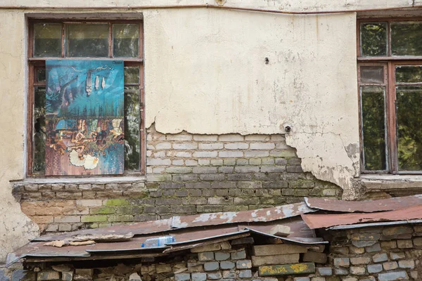 Textured walls and ruins of an old house