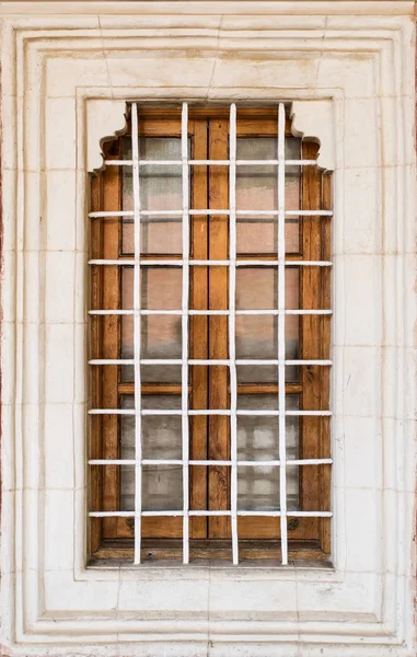 Wall of a residential block of flats with balconies windows