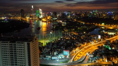Güzel manzara günbatımı Ho Chi Minh city veya Sai Gon. Lisanslı yüksek kaliteli ücretsiz stok görüntü Ho Chi Minh City geliştirme binaları ile. Ho Chi Minh city Vietnam'en büyük şehridir