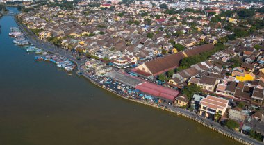 Aerial view panorama of Hoi An old town or Hoian ancient town. Royalty high-quality free stock photo image top view rooftop of street walking in Hoi An city. HoiAn city is UNESCO world heritage site clipart