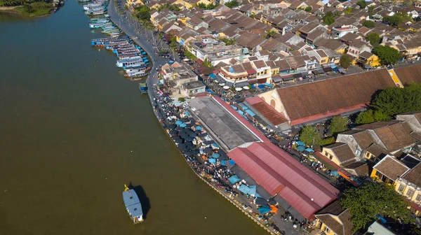 Panorama of Hoian market. Aerial view of Hoi An old town or Hoian ancient town. Royalty high-quality free stock photo image top view of Hoai river and boat traffic in HoiAn market. Hoian city, Vietnam