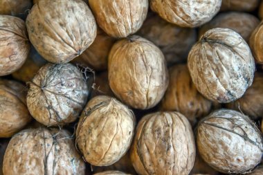 Desen arka plan bulanık kenarları çerçeve doğal gıda Kabuklu Fındık ceviz desen zemin ceviz kabuğu arka plan dramatik aksine doğal ceviz arka plan desen doku soyut ceviz yığın