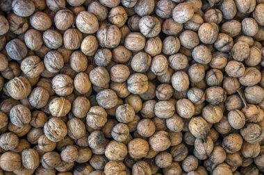 Desen arka plan bulanık kenarları çerçeve doğal gıda Kabuklu Fındık ceviz desen zemin ceviz kabuğu arka plan dramatik aksine doğal ceviz arka plan desen doku soyut ceviz yığın