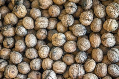 Desen arka plan bulanık kenarları çerçeve doğal gıda Kabuklu Fındık ceviz desen zemin ceviz kabuğu arka plan dramatik aksine doğal ceviz arka plan desen doku soyut ceviz yığın