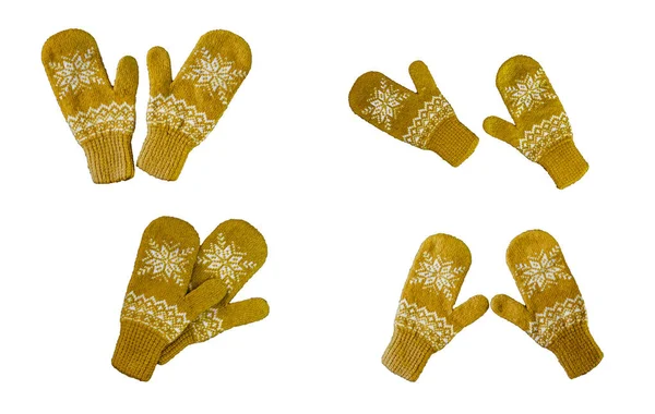 Pair of yellow orangeknitted mittens with christmas pattern isolated on — Stock Photo, Image