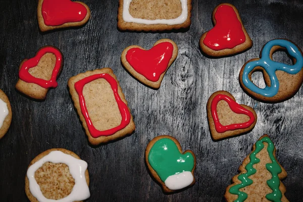 Christmas gingerbread with christmas decorations on dark stone background. Christmas baking background. Top view with copy space. — Stock Photo, Image