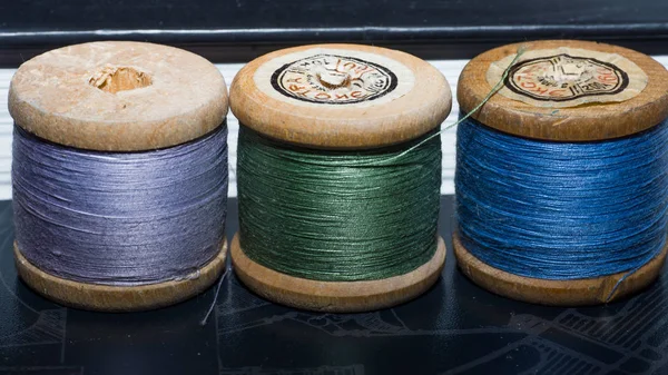 Colorful yarn on spool, yarn on tube, cotton, wool, linen thread