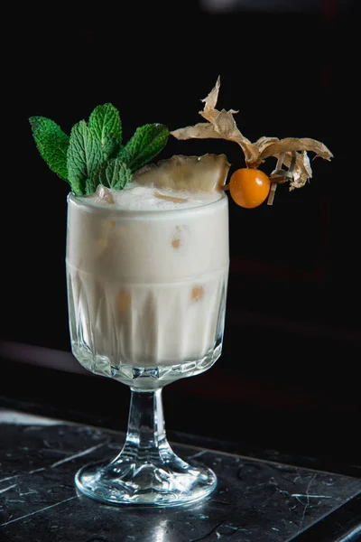 Pina Colada cocktail. exemplary tropical mixed drink with rum, pineapple and coconut drain