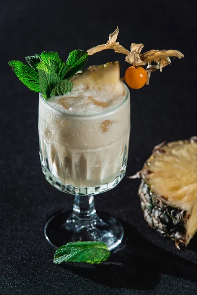 Pina Colada cocktail. exemplary tropical mixed drink with rum, pineapple and coconut drain