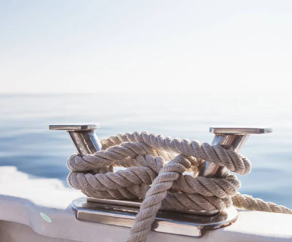 Ship's ropes on the yacht in Ligurian Sea, Italy. Close-up of a mooring rope