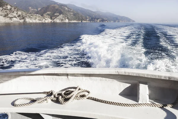 Ship\'s ropes on the yacht in Ligurian Sea, Italy. Close-up of a mooring rope