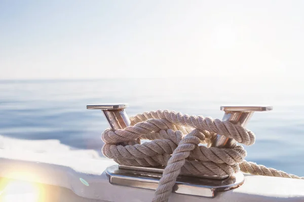 Ship's ropes on the yacht in Ligurian Sea, Italy. Close-up of a mooring rope