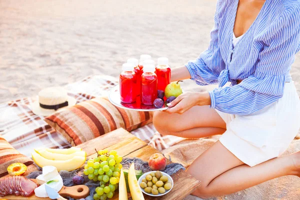 Happy Woman Holds Dish Drinks Red Juice Sunset Picnic Theme — Stock Photo, Image
