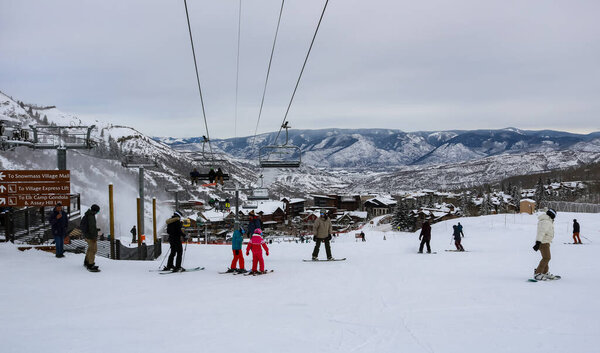 Skiers skiing in the Aspen Snowmass Ski Resort in Colorado