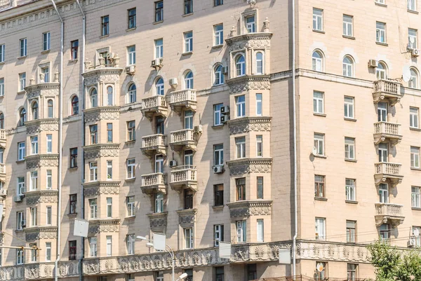Bay Windows and balconies of the ten-storey brick residential apartment house on Prospekt Mira was Built in 1959. Moscow, Russia