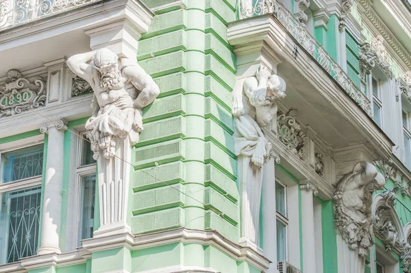 Moscow, Ilinka street. A fragment of the building of the former Volga-Kama commercial Bank, built in 1890. Now Russian school of private law. Sculptures of Atlantes on the facade