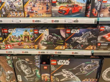 France, March 2 2024: Assortment of LEGO Star Wars Sets on Store Shelves clipart