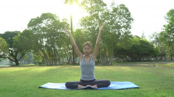 Young Asian Woman Yoga Outdoors Keep Calm Meditates While Practicing — Stock Video