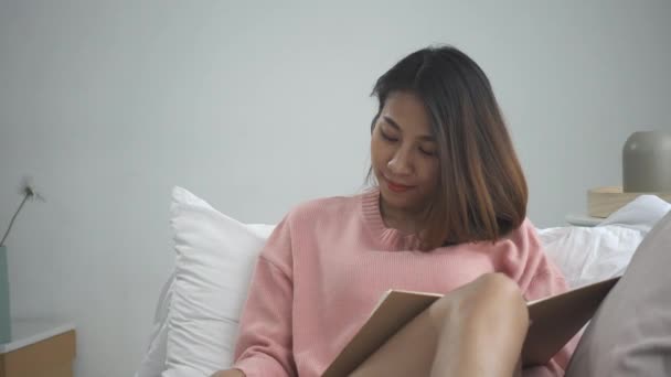 Happy Young Asian Woman Studying Home Reading Sms Text Message — Stock Video