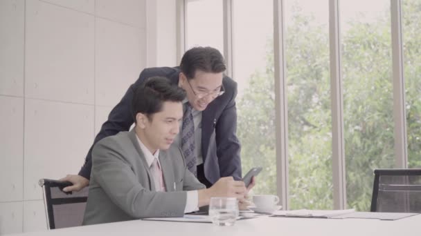 Slow Motion Smart Handsome Businessmen Using Smartphone Check Stock Market — Stock Video