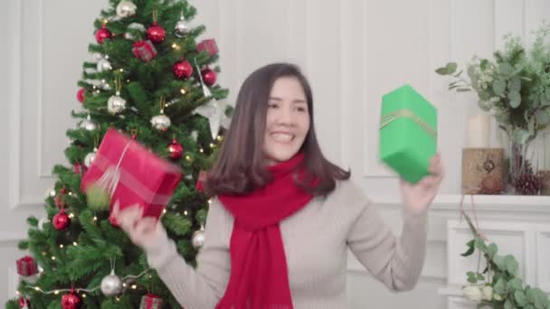 Cheerful Happy Young Asian Woman Holding Christmas Gifts Smiling Camera — Stock Video
