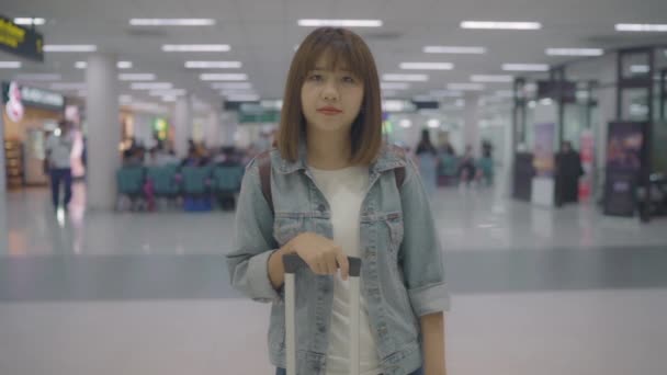 Slow Motion Happy Asian Woman Smiling Camera While Staying Terminal — Stock Video