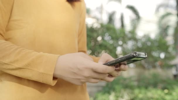 Cheerful Asian Tourist Blogger Woman Using Touchscreen Technology Smartphone While — Stock Video